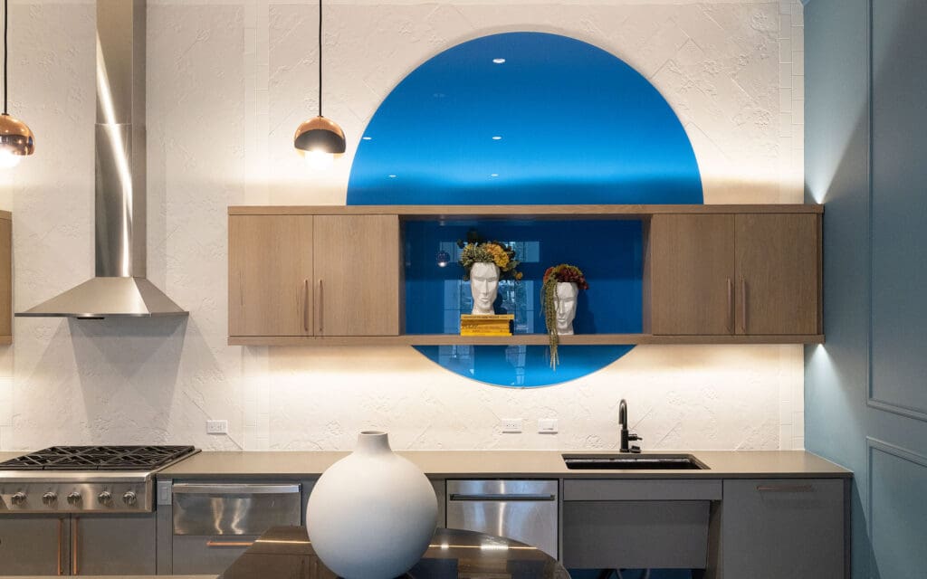 Dreamwalls blue backpainted glass circles at The Margo Apartments in TX-03